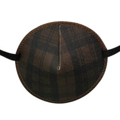 En ögonlapp med resår för vuxna. Den är i brunt, rutigt tyg med ett klassiskt check-mönster. Märket är Kay Fun Patch. Den heter Brown Check.